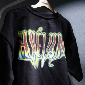 PLAYERA BOXY HUELUM